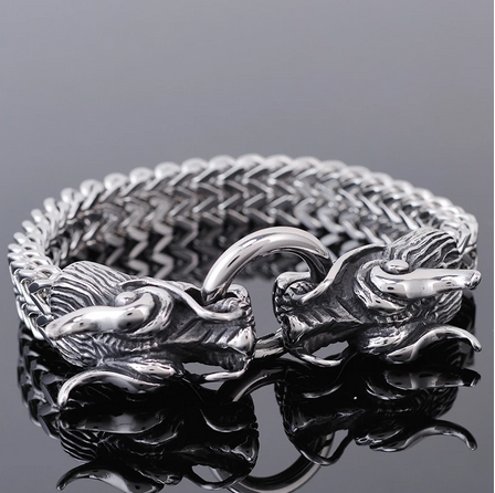 bracelet acier avec tetes de dragon torque