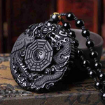 collier pendentif perle dragon noir